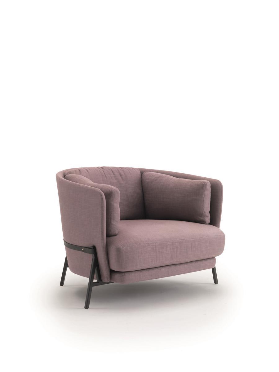 Fabric armchair with armrests with integrated magazine rack | Cradle by Arflex