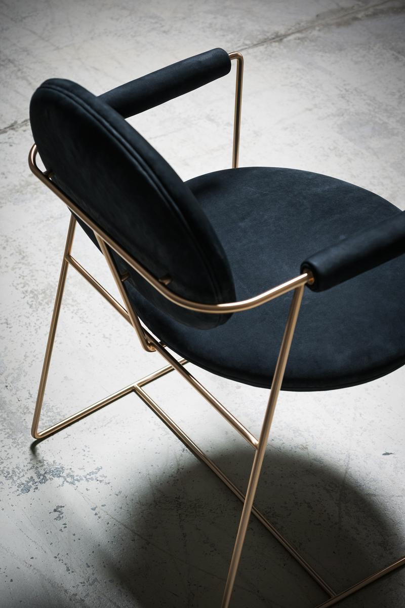 Upholstered leather chair with armrests | Gemma by Baxter