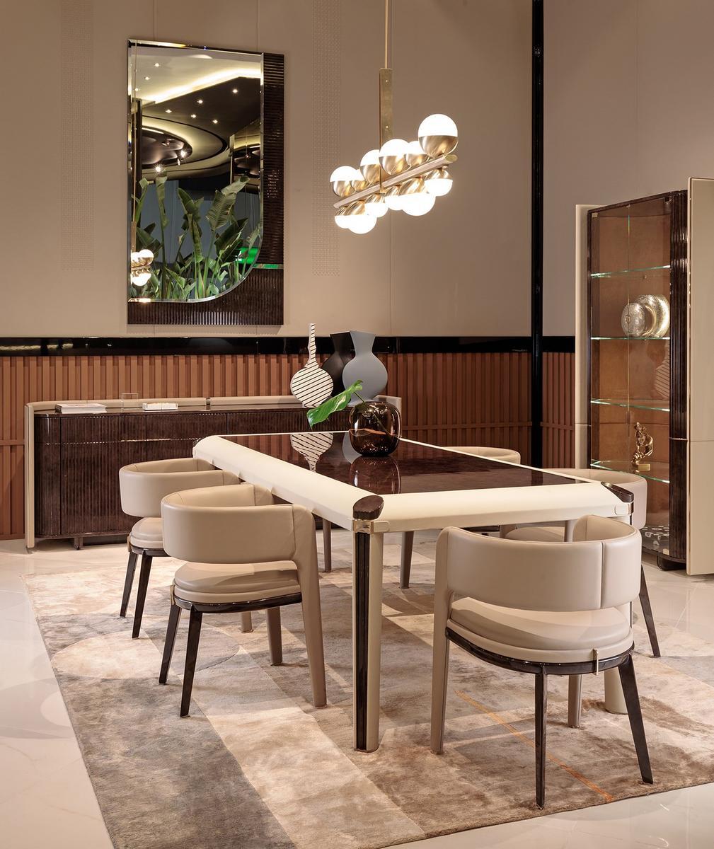 Leather easy chair with armrests | Eclipse by Turri