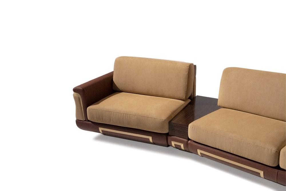 Sectional curved leather sofa | Adone by Mantellassi 1926