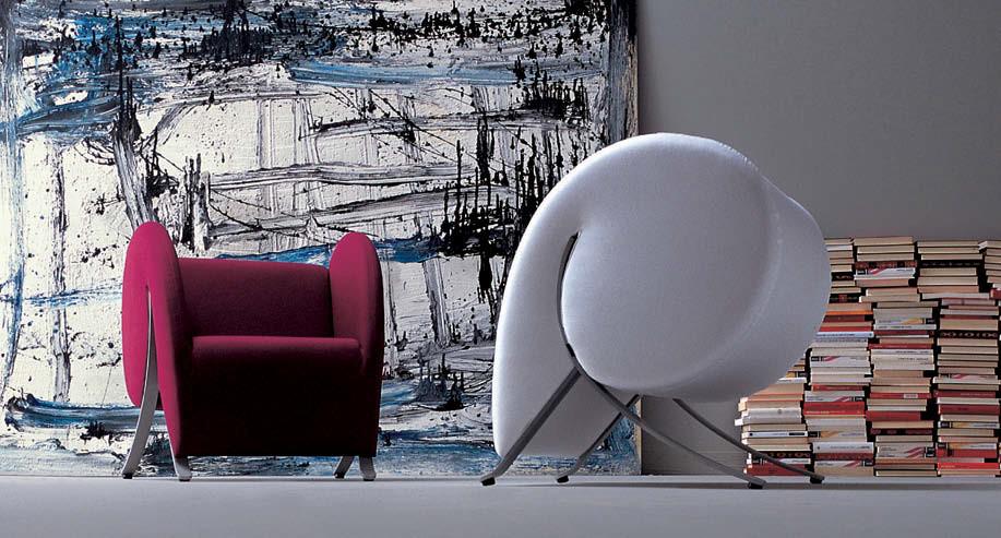 Upholstered fabric easy chair with armrests | Virgola by Arflex