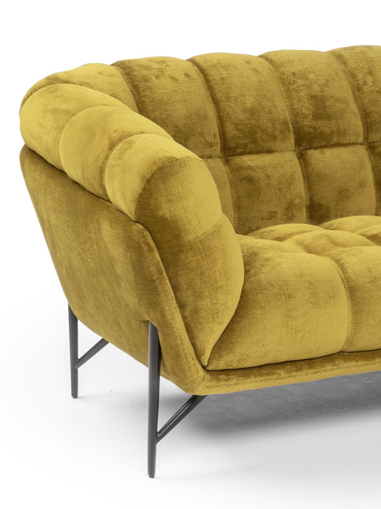 Contemporary Liberty sofa with sophisticated elegance, featuring soft, enveloping quilting and raised on sleek metal feet for an elevated aesthetic. | Liberty by Calia Italia