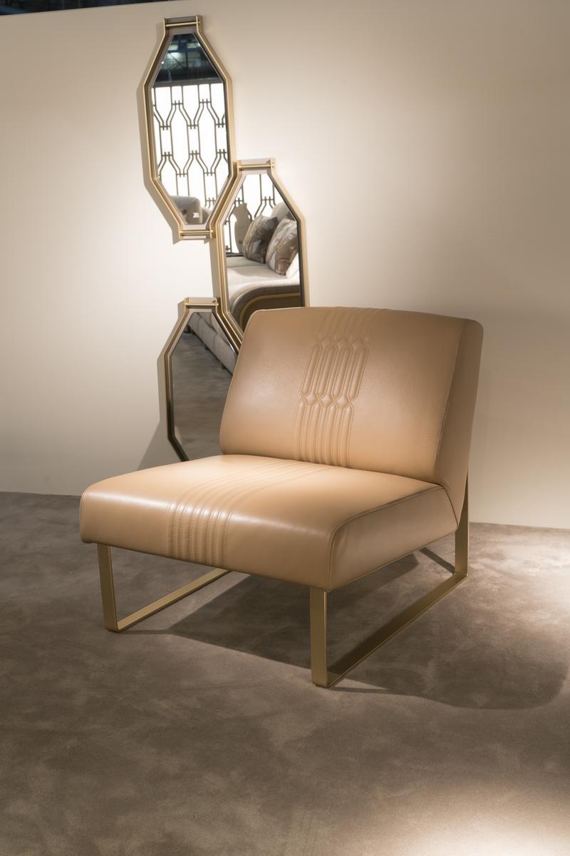 Leather armchair and metal base | Pandora by Bruno Zampa
