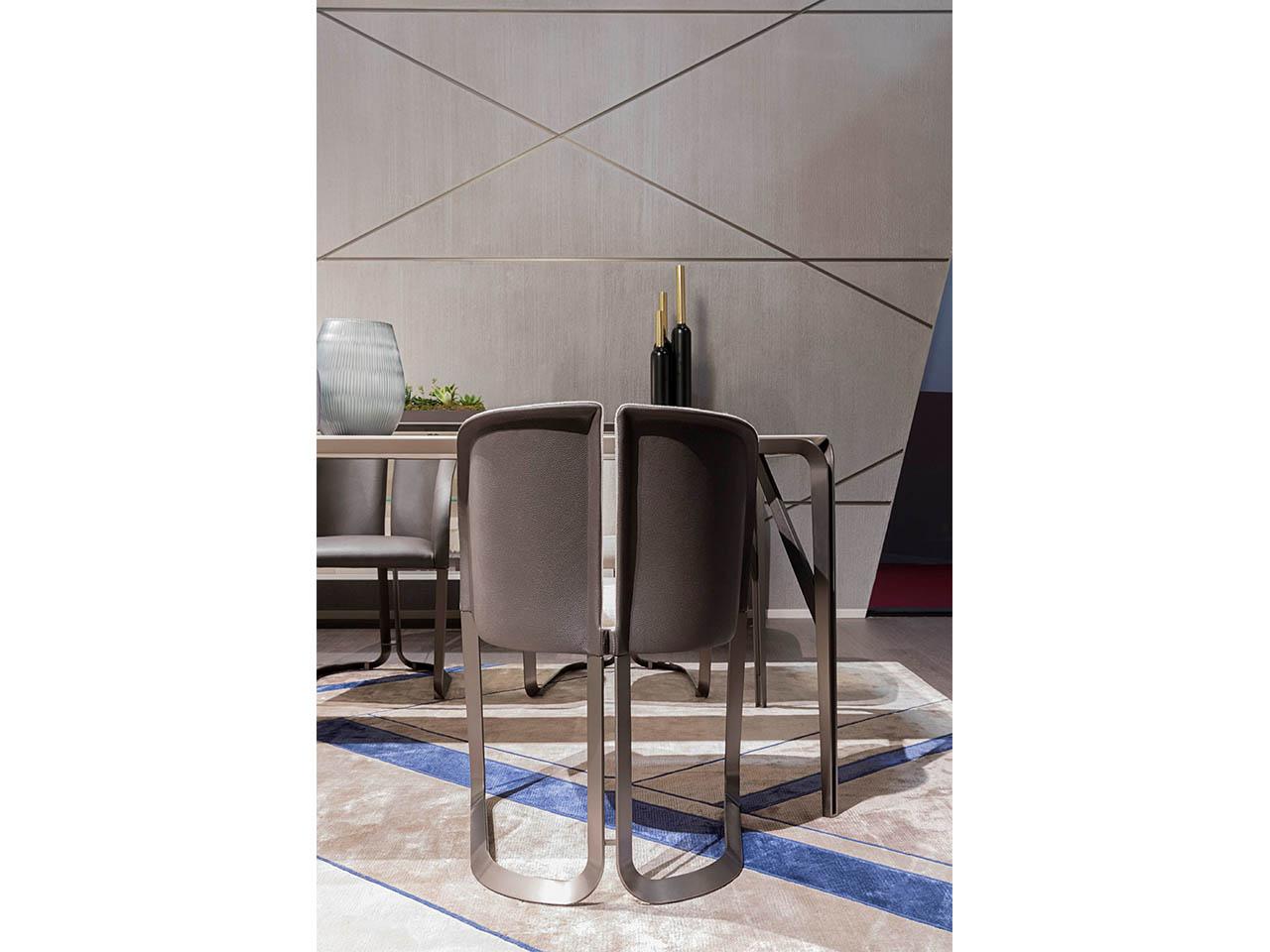 Upholstered chair with armrests | Milano by Turri