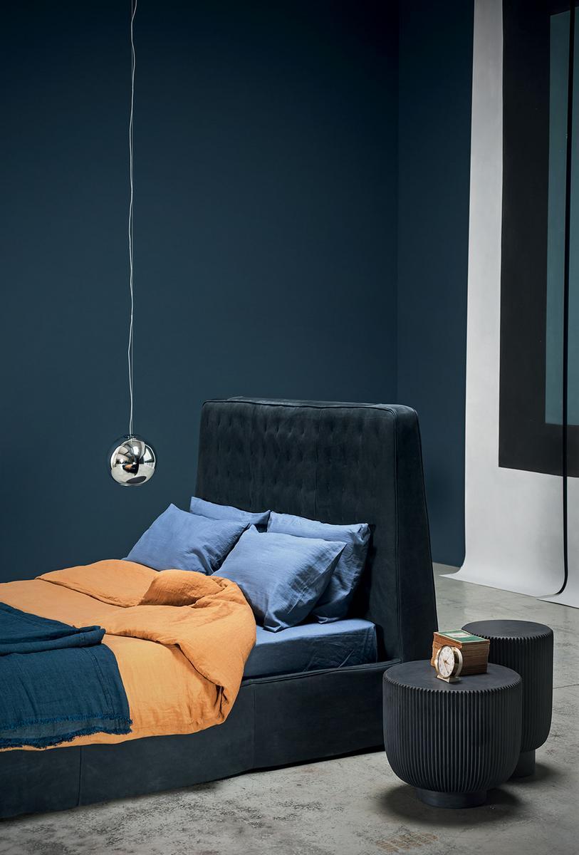 Leather bed with upholstered headboard |  by Baxter