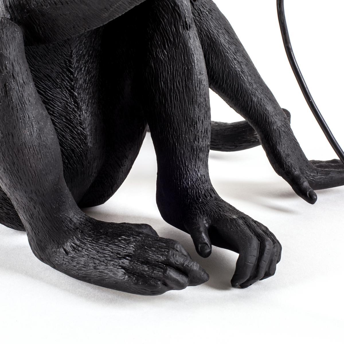 LED resin floor lamp | The Monkey Lamp Black Sitting by Seletti