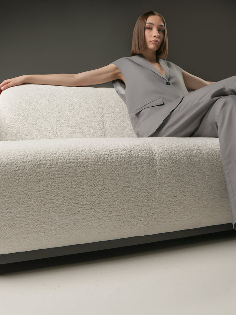 Iconic 'Hotel' armchair with a timeless Art Deco design, renowned for comfort and versatility, available in leather or fabric, celebrated by decorators worldwide. | Hotel by Calia Italia