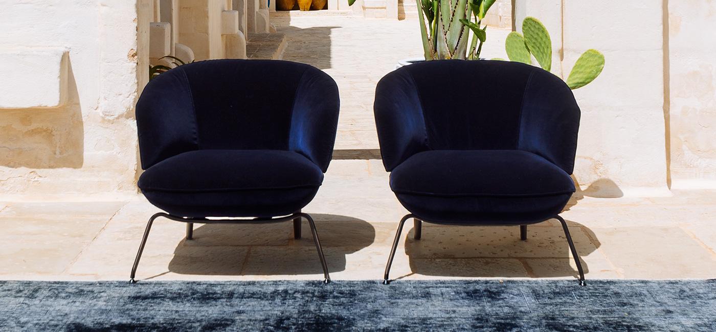 Fabric easy chair with armrests | Penelope by Natuzzi Italia