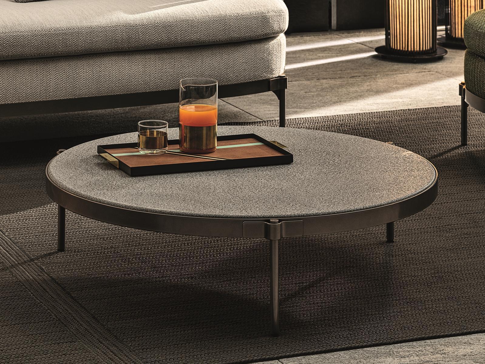 Round stone garden side table | Tape Cord Outdoor by Minotti