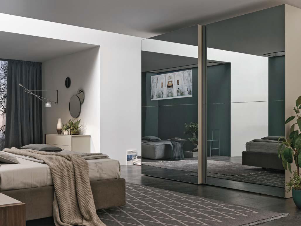 Sectional wardrobe with sliding doors with built-in TV | Vision by Tomasella