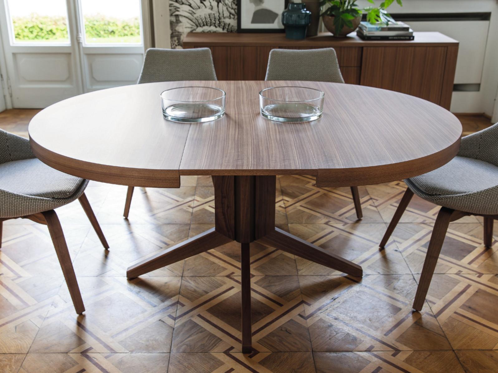 Extending round walnut table | Bryant by Porada