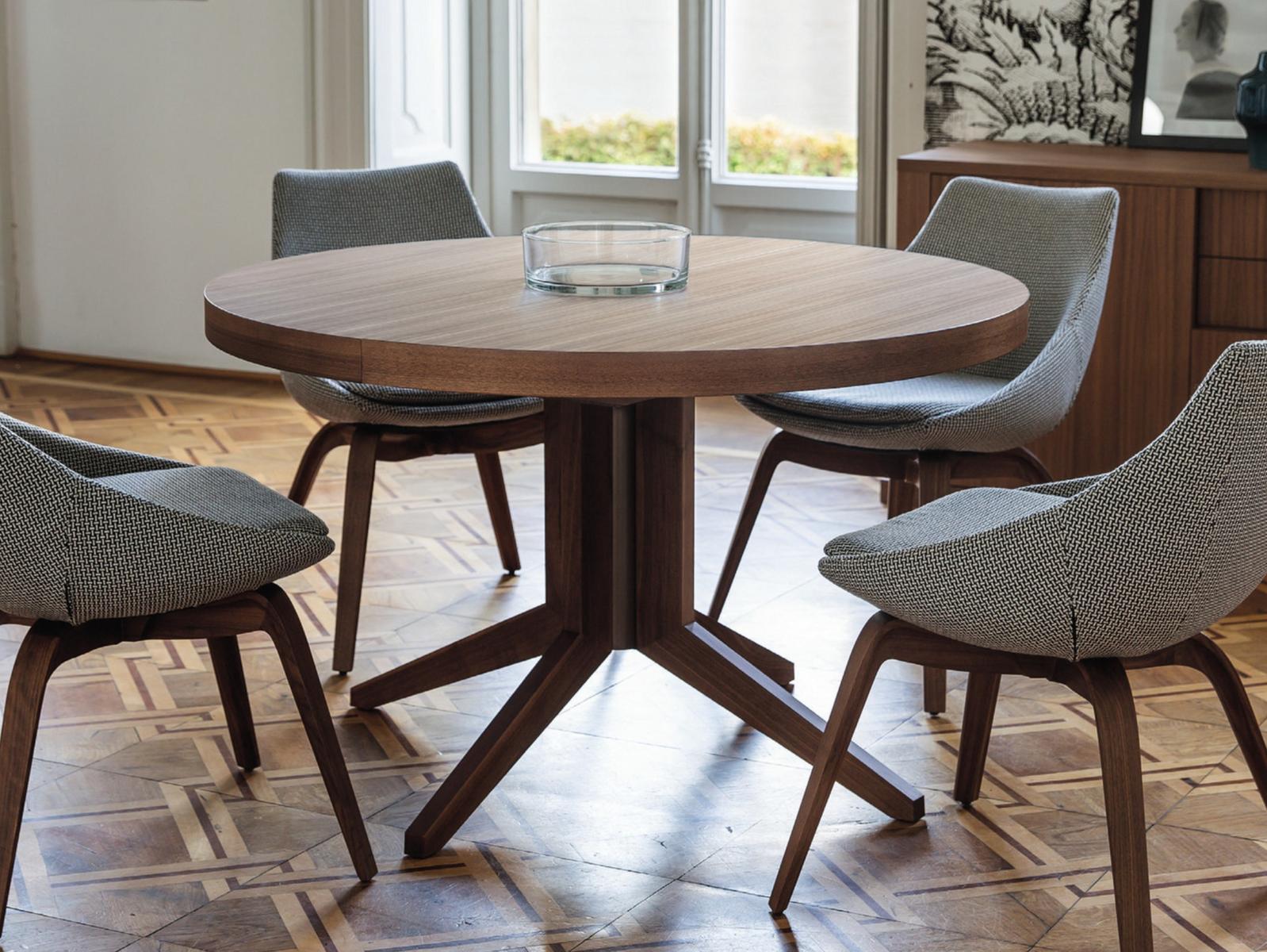 Extending round walnut table | Bryant by Porada