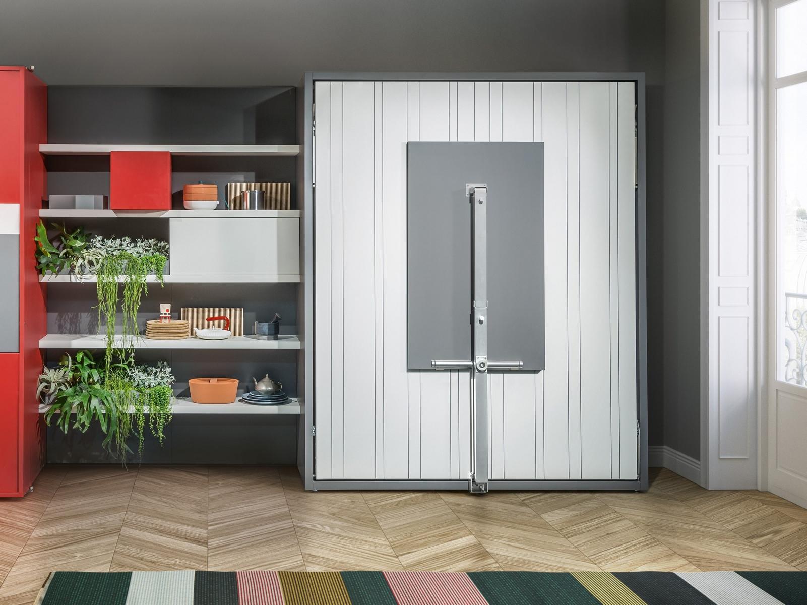 Storage wall with fold-away bed | Penelope 2 Dining by CLEI