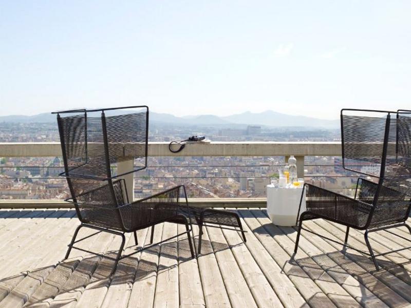 Garden armchair with footstool | Fifty by Ligne Roset