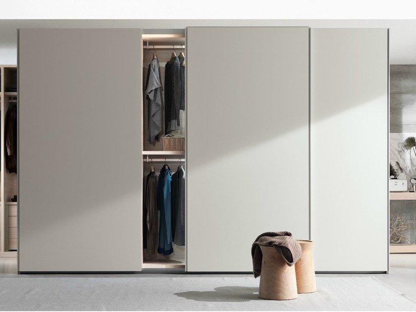 Wardrobe with sliding doors | New Entry by Poliform