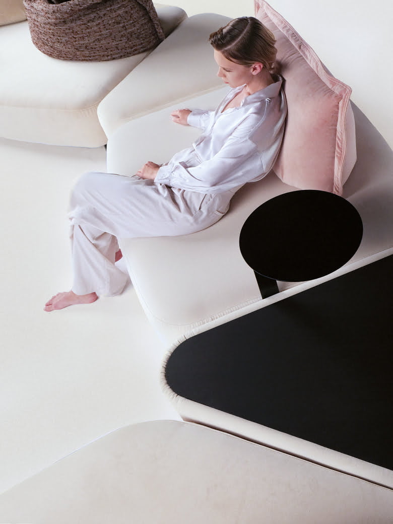 Modular sofa with moveable backrests and versatile configurations, providing flexible comfort and Italian-inspired design aesthetics for innovative living spaces. | Cremino by Calia Italia
