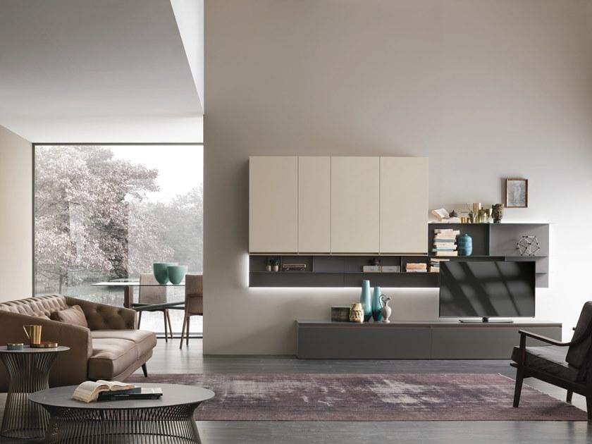 Sectional storage wall with integrated lighting | Unit A104 by Tomasella