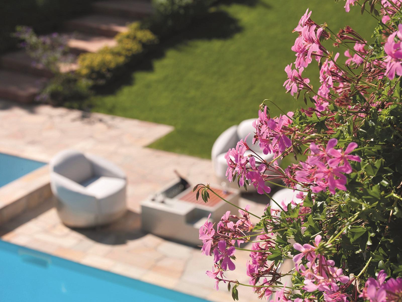 Fabric outdoor armchair | Astrea by Longhi