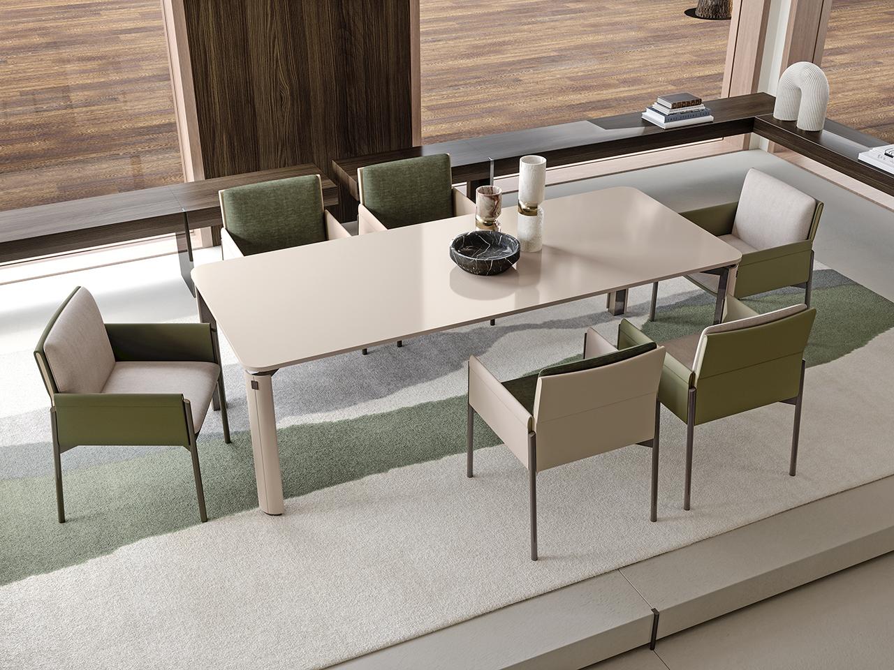 Chair with armrests covered in leather and fabric | Zenit by Turri