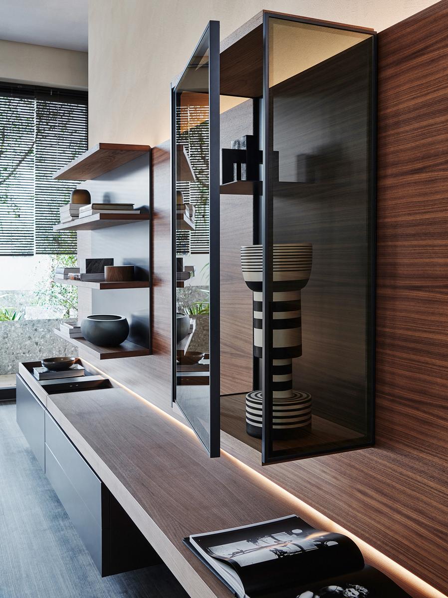 Sectional wooden storage wall with integrated lighting | Grid by Molteni