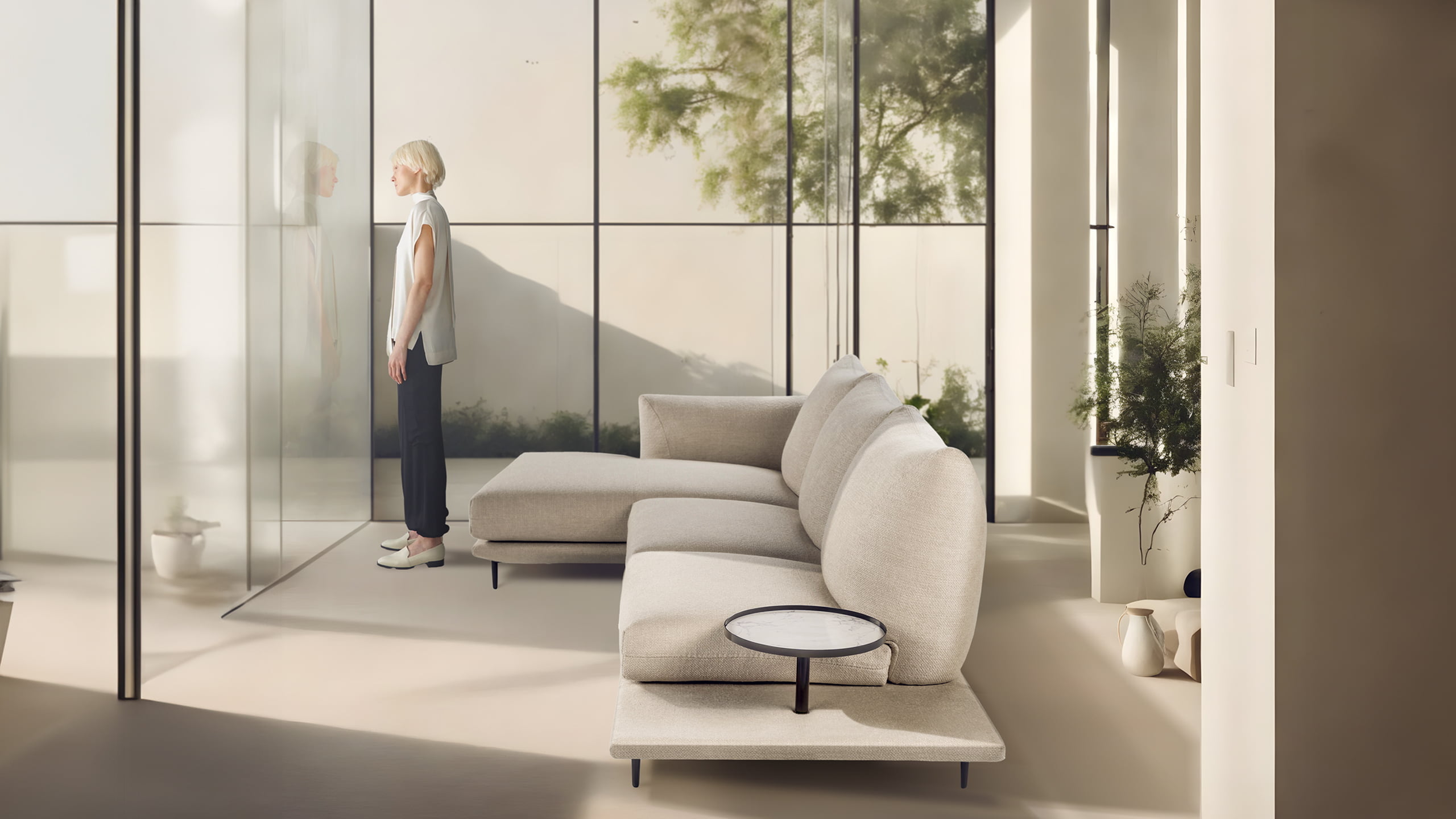Elegant sectional with heightened backrests for superior comfort, minimal base, and decorative stitching, combining sophistication with supported relaxation. | Dragées by Calia Italia