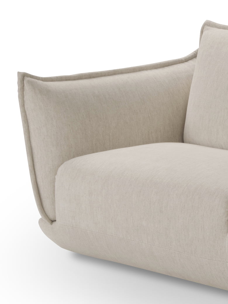 The Éclair sofa features an innovative design with sculptural volumes, decorative stitching, and comfortable seating, available in various sizes for modern and attractive interiors. | L'Eclair by Calia Italia