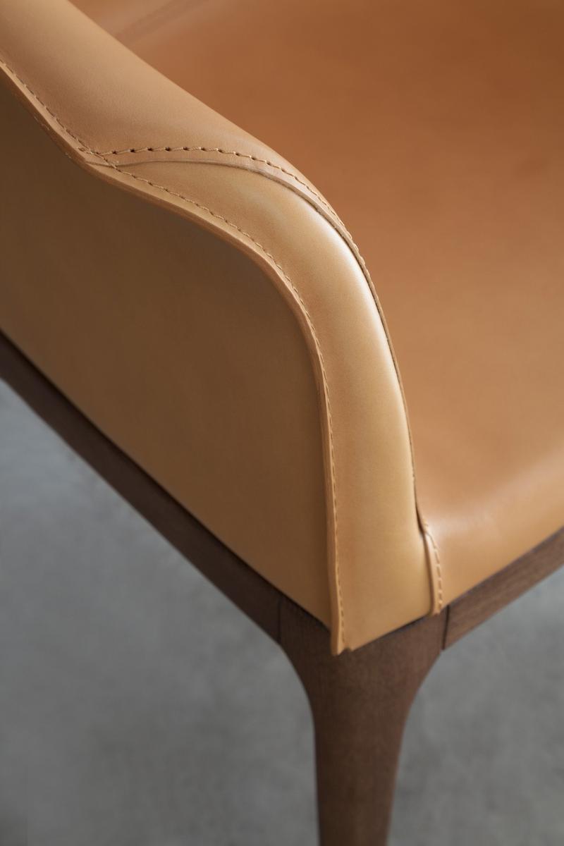 Upholstered easy chair with armrests | Mivida by Tonin Casa