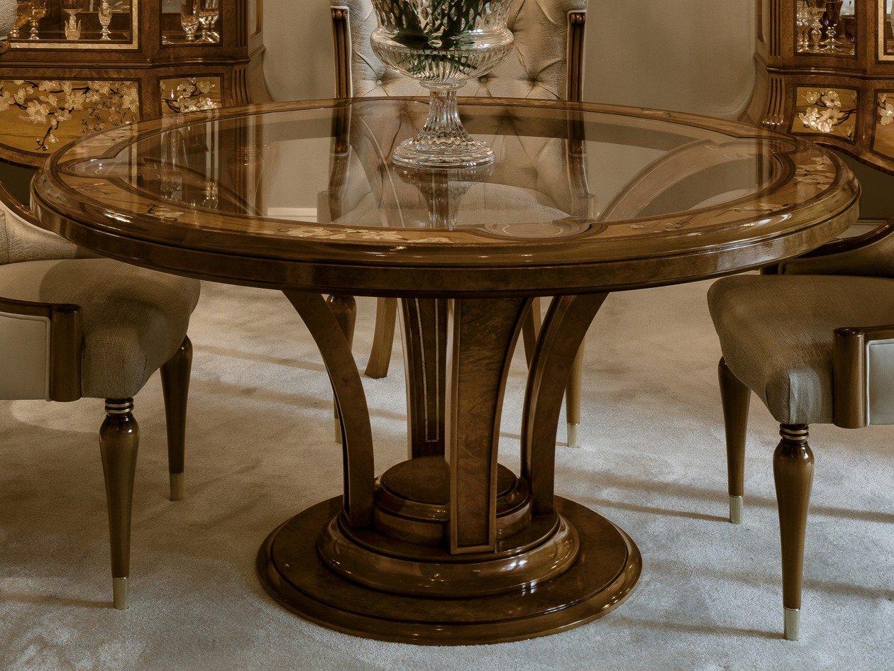 Round chestnut dining table | 1430 by Ezio Bellotti