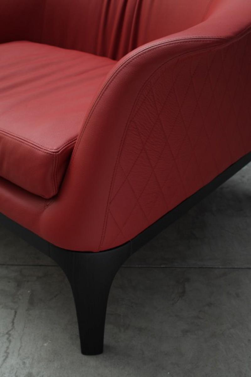 Upholstered leather armchair with armrests | Tiffany by Tonin Casa