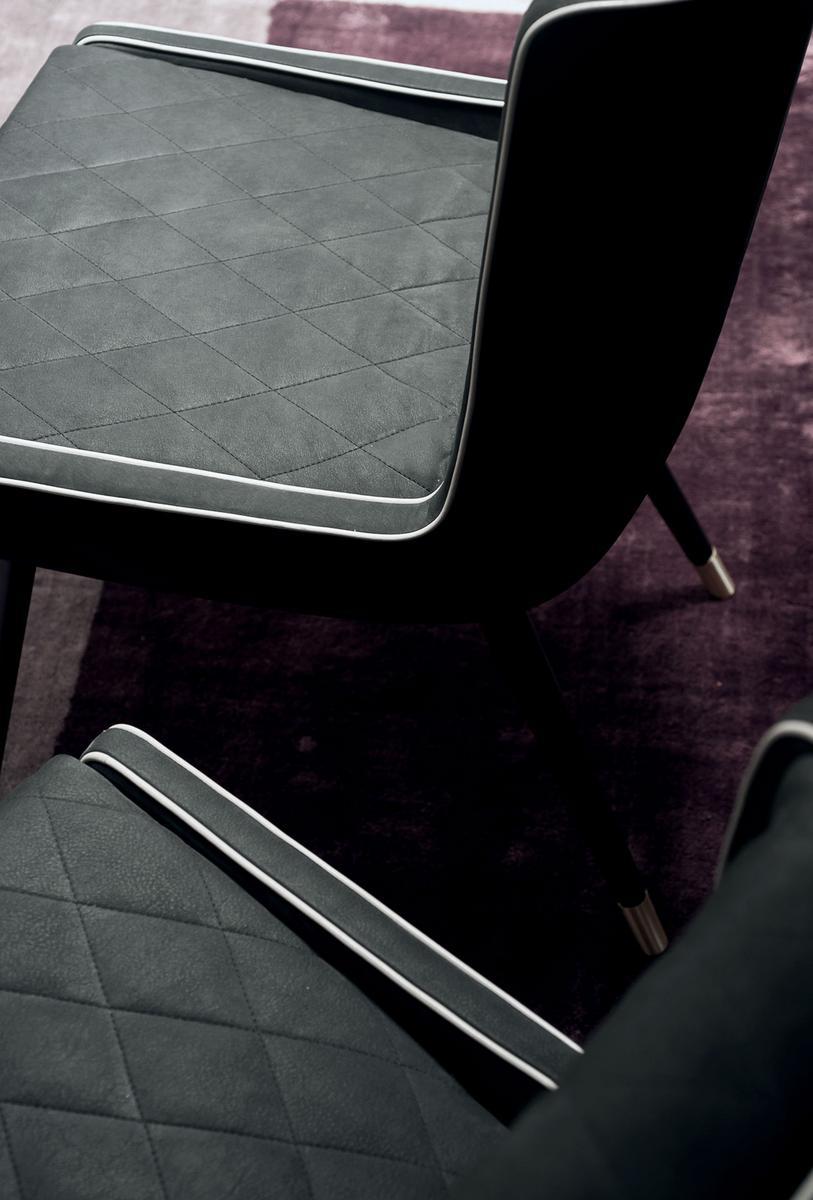 Upholstered leather chair | Dolly Baby by Baxter