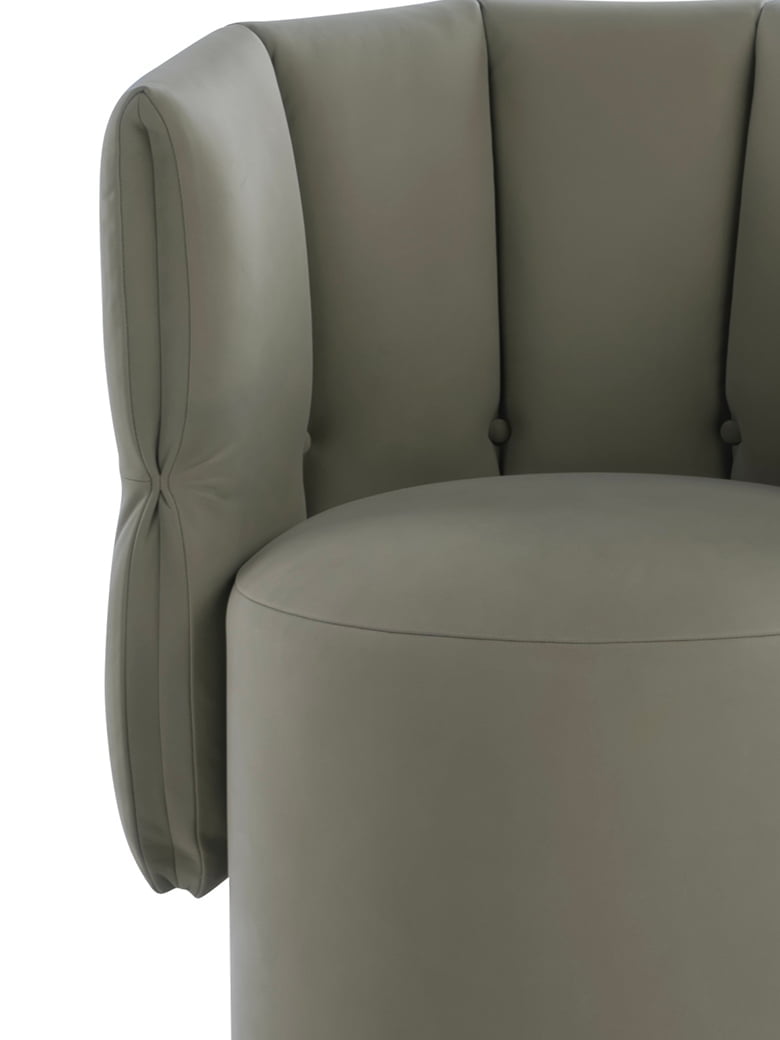 Madame G chair blends Italian elegance with a universal tulip design, offering comfort, swivel functionality, and a unique 'Made in Italy' statement piece for any space. | Madame g by Calia Italia