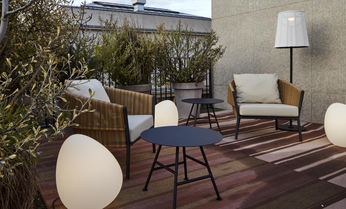 Garden rattan easy chair with integrated cushion | Label by Ligne Roset