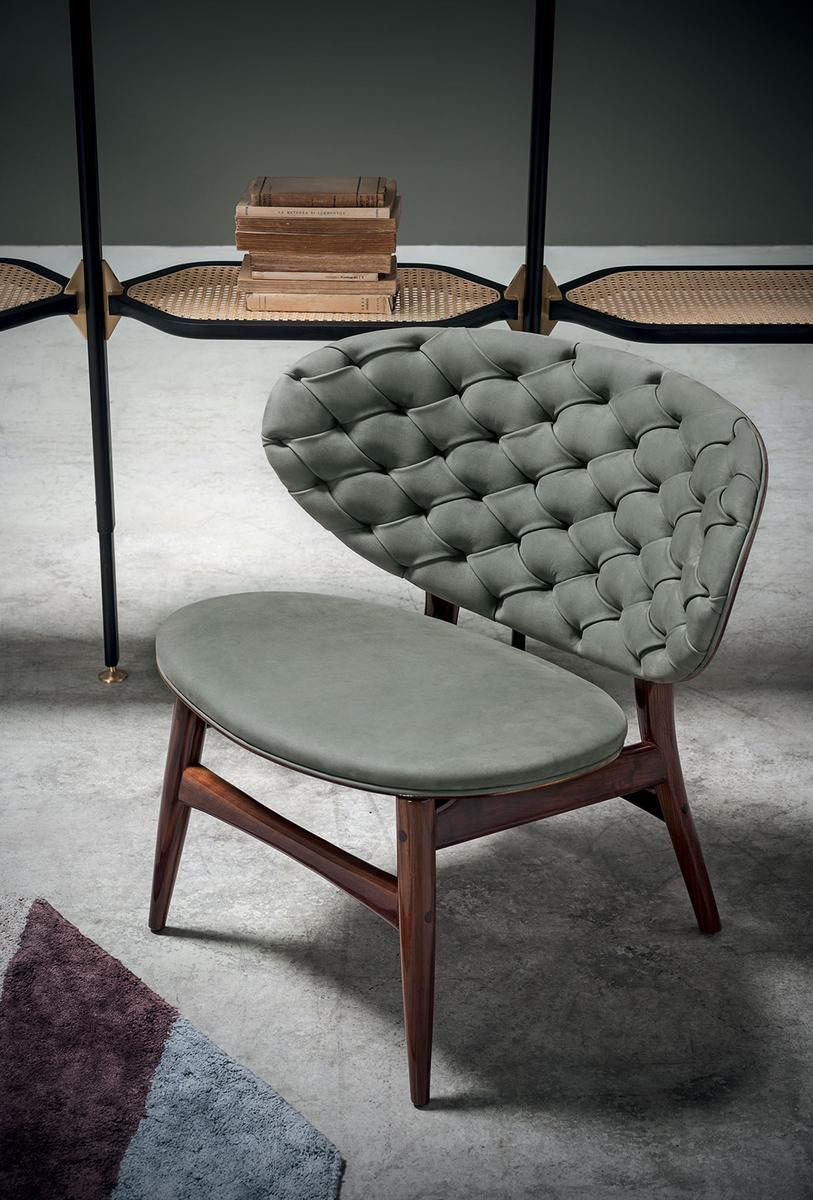 Tufted leather easy chair | Dalma by Baxter