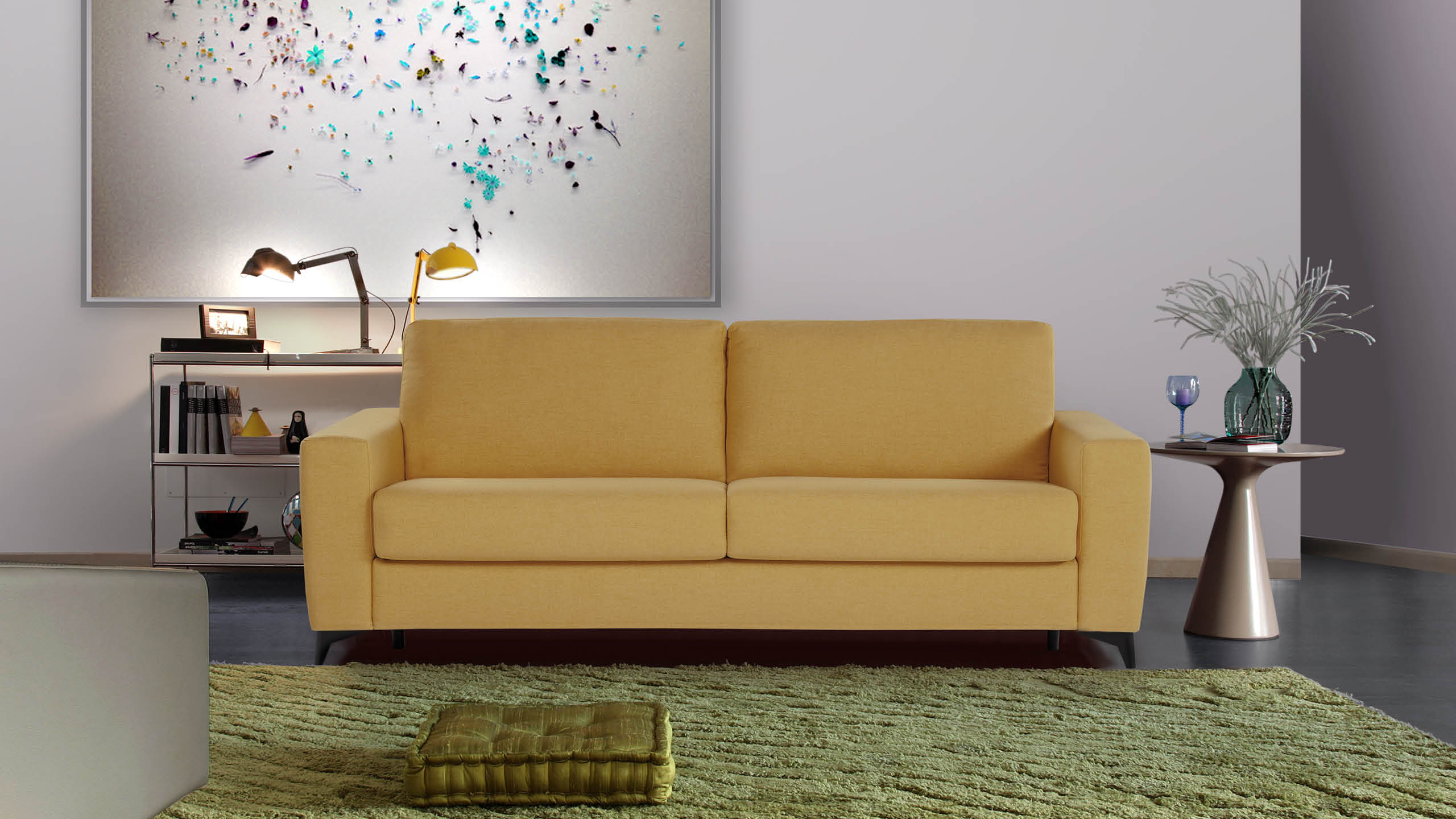 The Alfa sofa boasts a sleek, minimalist design ideal for any home, with options for a thicker mattress and an enclosed base. | Alfa by Calia Italia