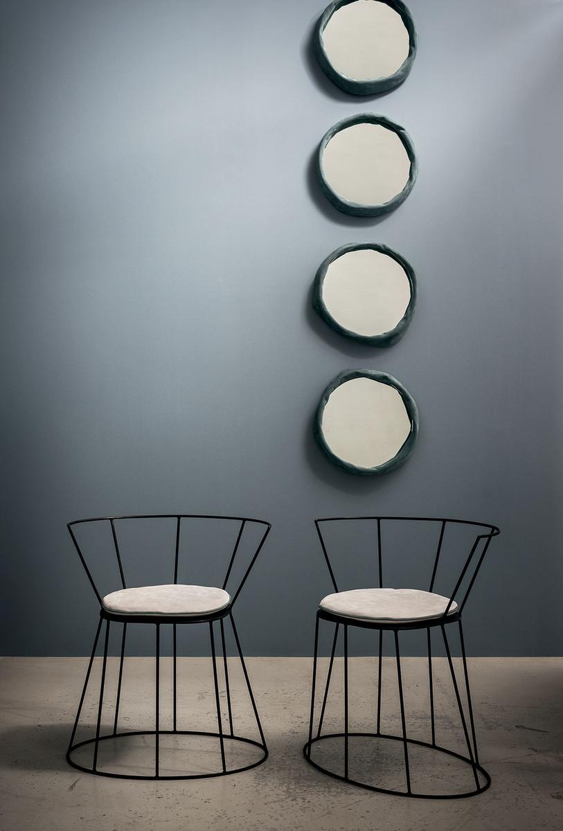 Iron chair with armrests |  by Baxter