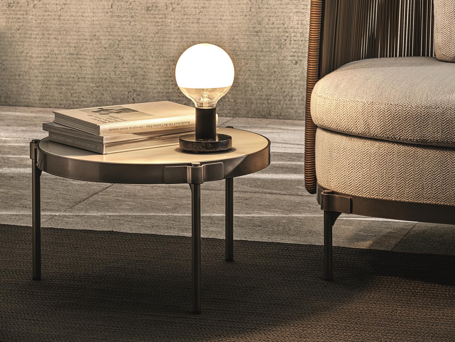 Round stone garden side table | Tape Cord Outdoor by Minotti