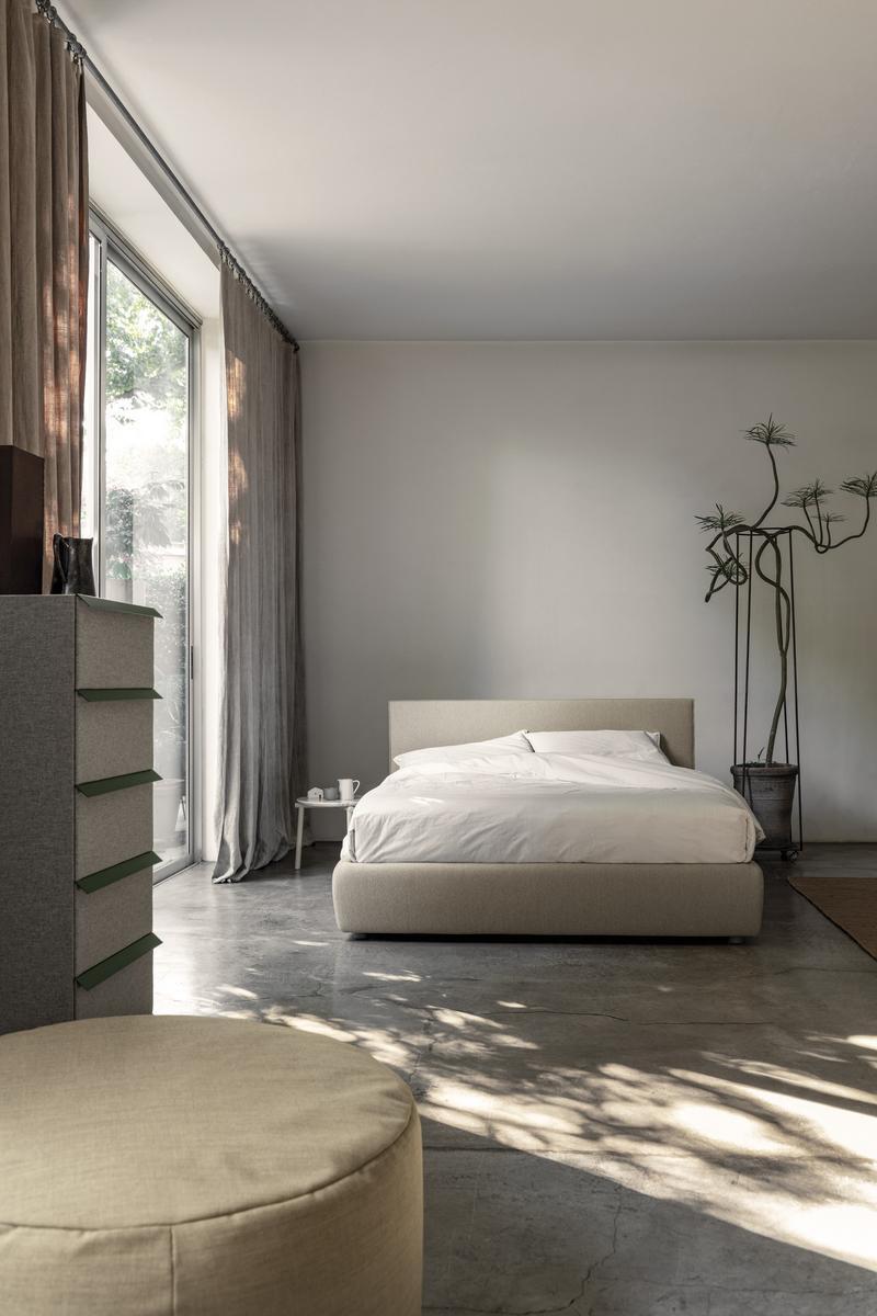 Storage bed with upholstered headboard | Metropolitan by Bolzan letti