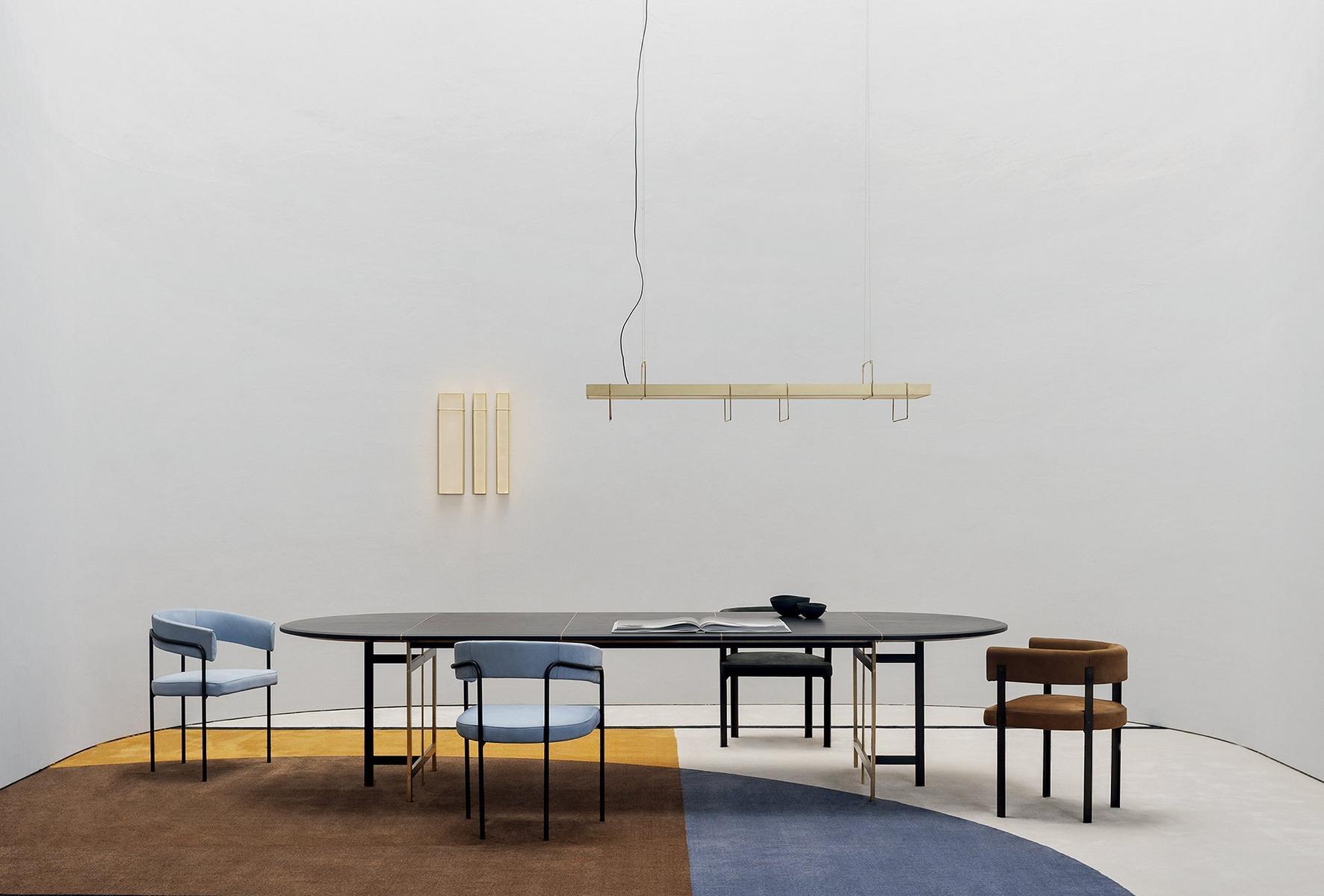 Upholstered leather chair with armrests | T-chair by Baxter