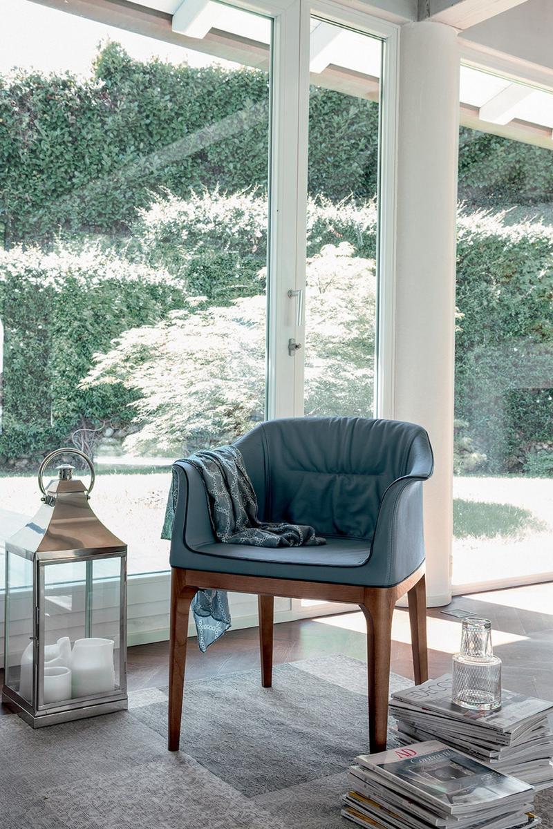Upholstered easy chair with armrests | Mivida by Tonin Casa
