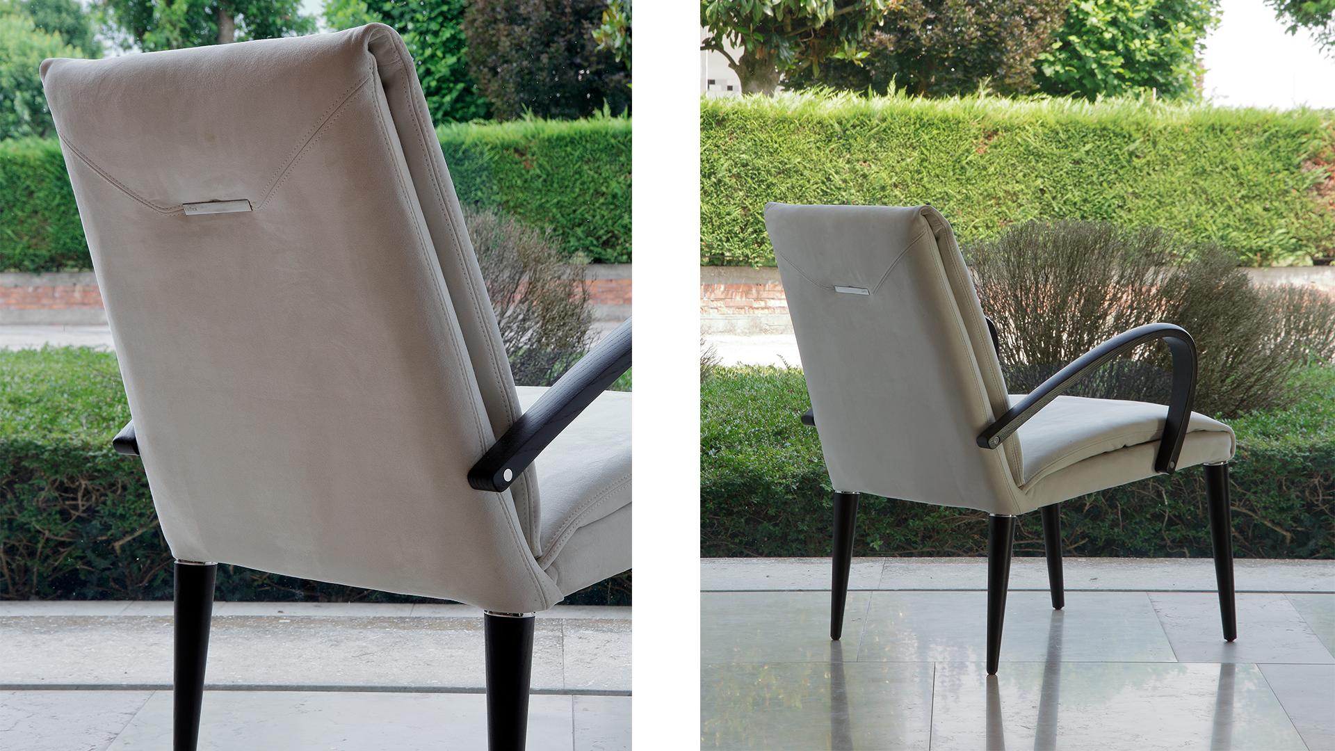 Upholstered leather easy chair with armrests | Soft by Reflex