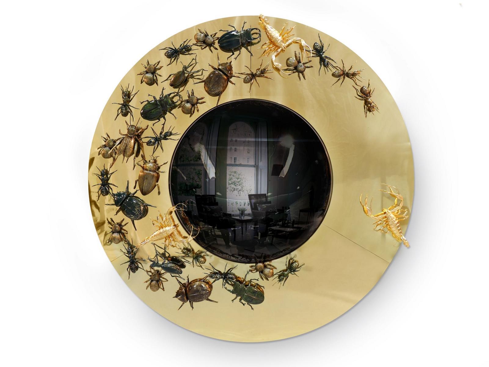 Round wall-mounted framed brass mirror | Convex Metamorphosis by Boca Do Lobo