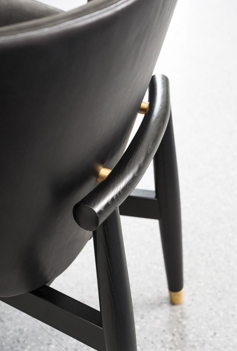 Leather armchair with armrests | Jorgen by Baxter