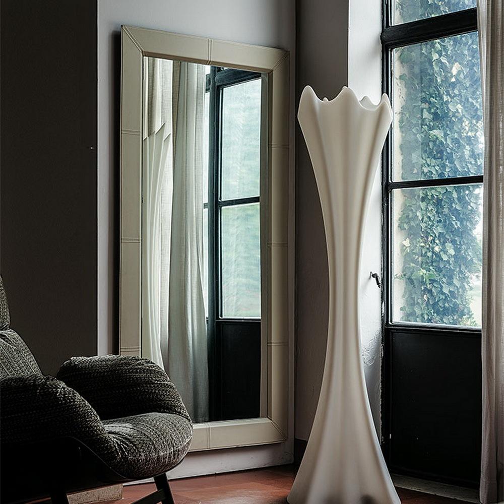 Rectangular leather mirror | Photo by Cattelan Italia