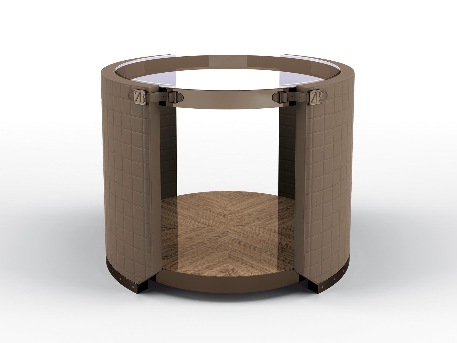 Round coffee table covered in leather and glass top | Rupert by Bruno Zampa