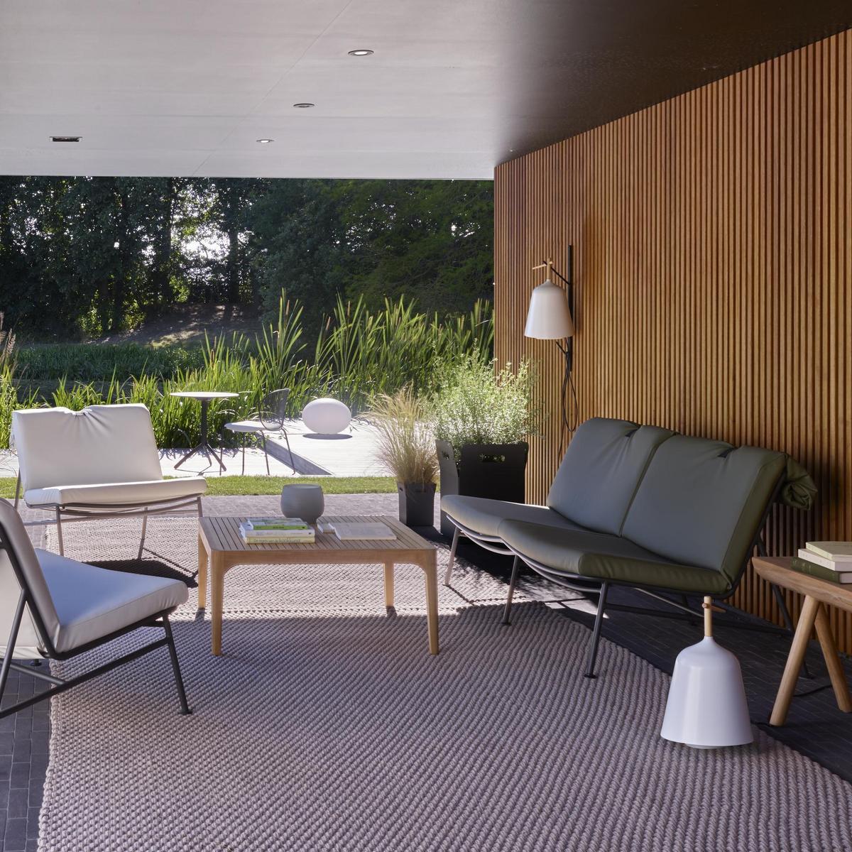 Steel garden chair with integrated cushion | Unbeaumatin by Ligne Roset