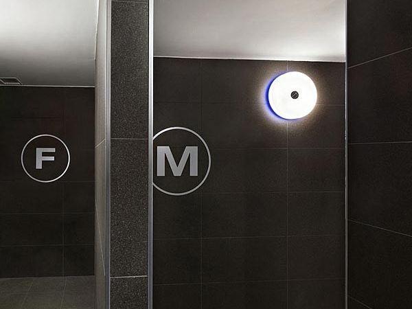 Polycarbonate wall lamp | Button by Flos