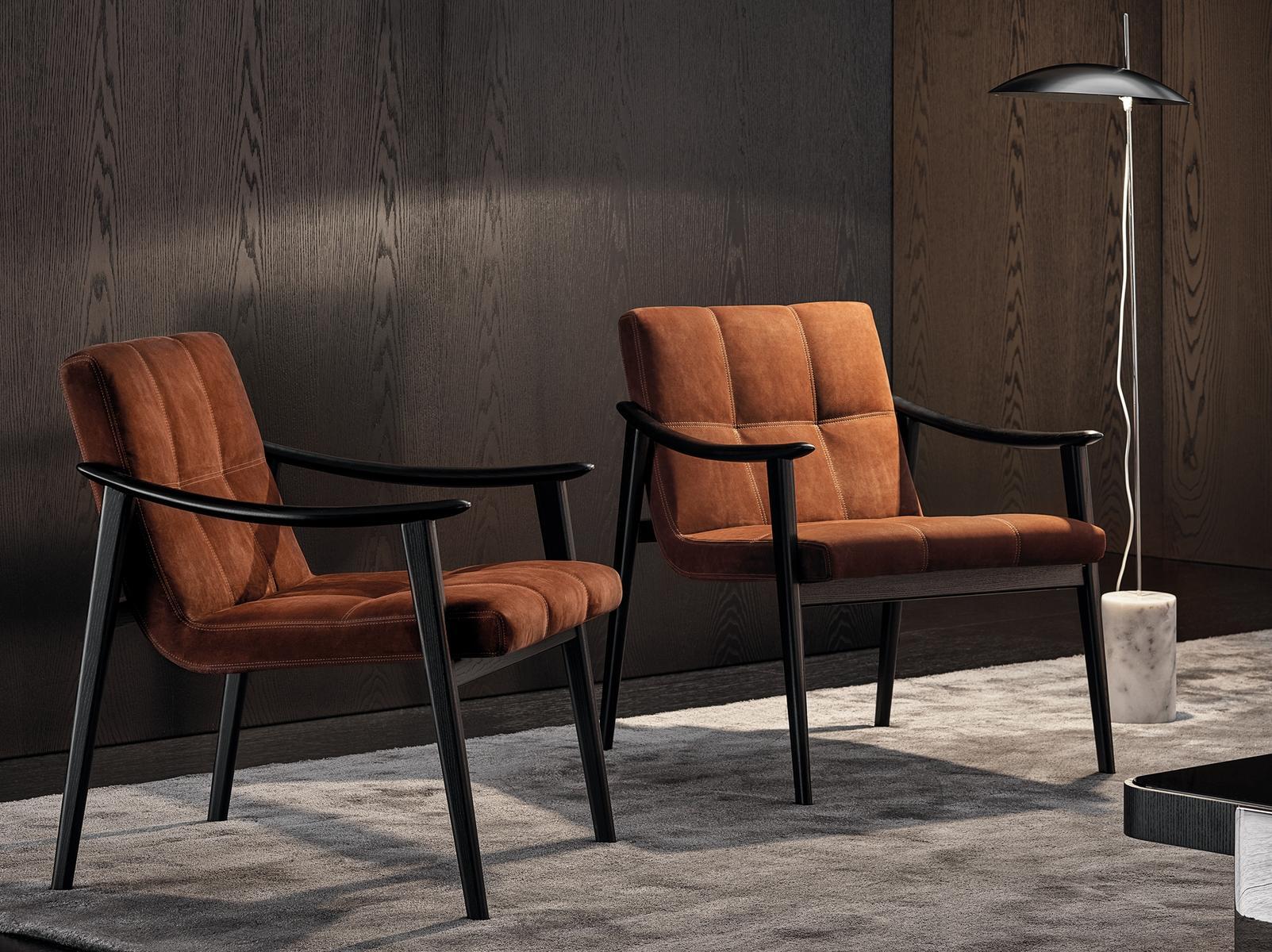 Upholstered easy chair with armrests | Fynn by Minotti