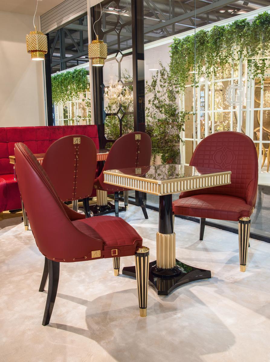Upholstered leather chair with armrests | Ophelia by Bruno Zampa