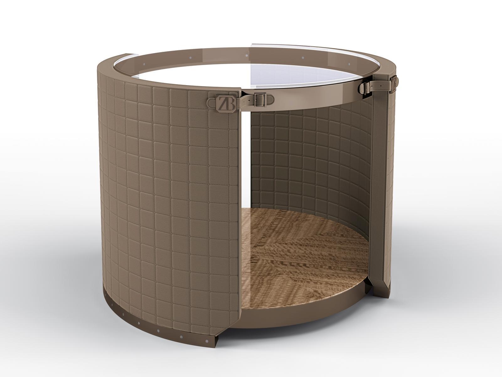 Round coffee table covered in leather and glass top | Rupert by Bruno Zampa