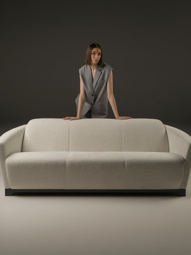 Iconic 'Hotel' armchair with a timeless Art Deco design, renowned for comfort and versatility, available in leather or fabric, celebrated by decorators worldwide. | Hotel by Calia Italia